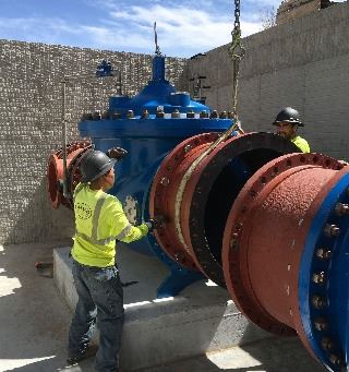 Workers securing a major water pipeline.